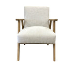 Ascot armchair in Oat linen with a mid-century inspired design and solid oak legs.