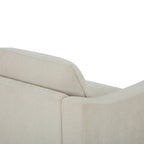 Close-up of the Asha sofa's back cushions, showcasing the soft fabric upholstery and supportive cushioning.