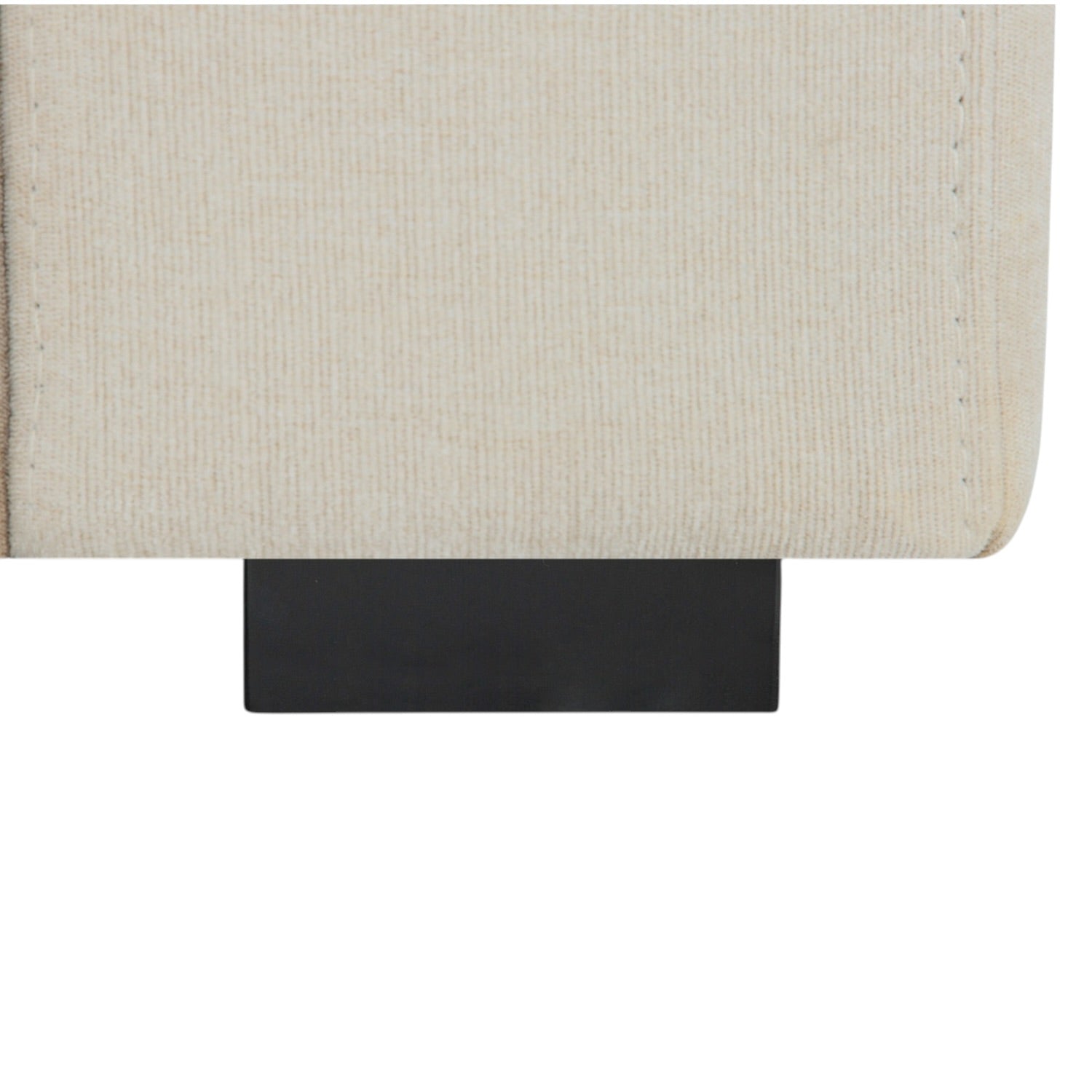 Close-up of the Asha sofa leg, highlighting its quality craftsmanship and contemporary design.