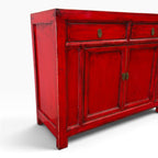 Angled view of the Elliot Sideboard in Chilli red showing panelled sides, distressed finish and metal hardware