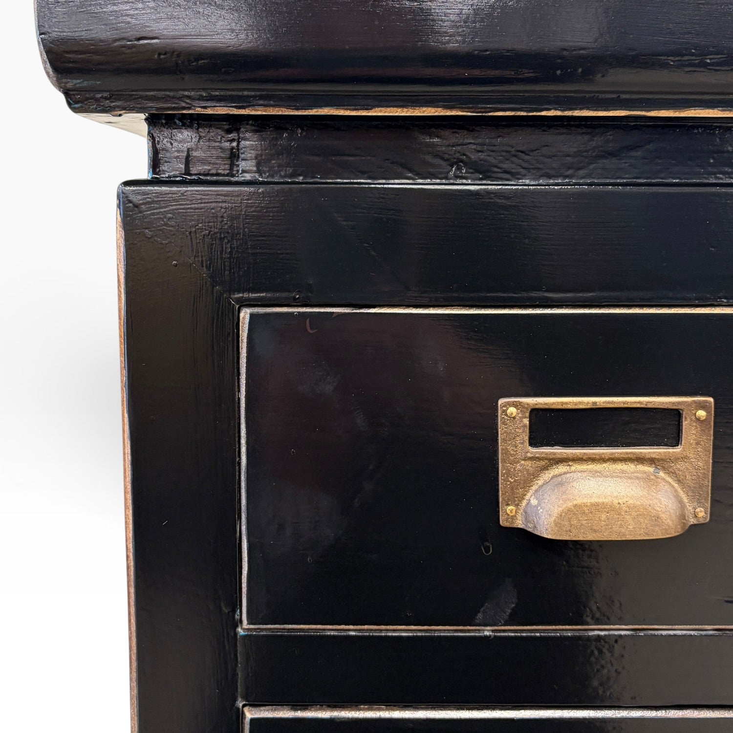 Close-up of Franklin 18 Drawer Cabinet showing black finish, aged detailing and brass-toned metal drawer handle