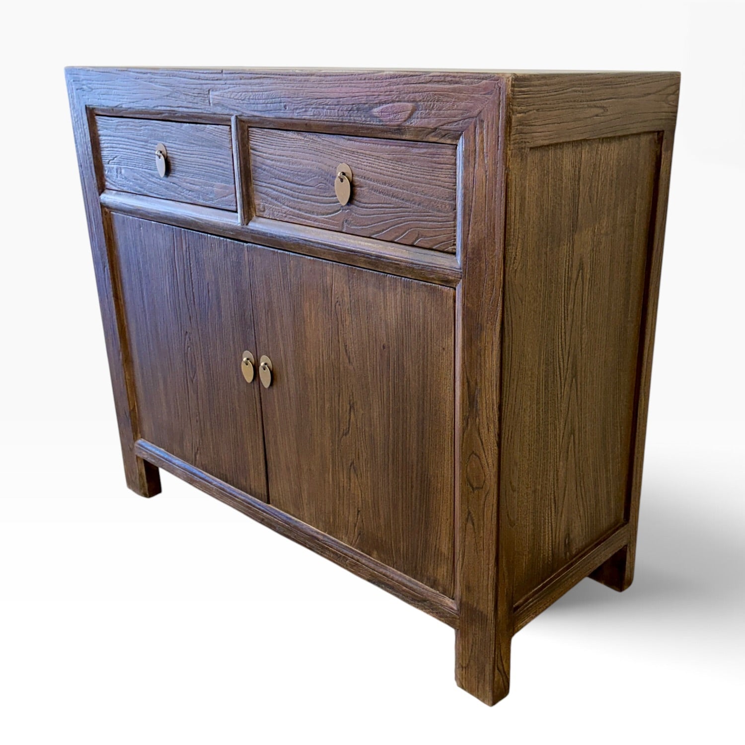 Angled view of the Quinn Sideboard in Canadian Brown Elm showing panelled side and natural timber grain