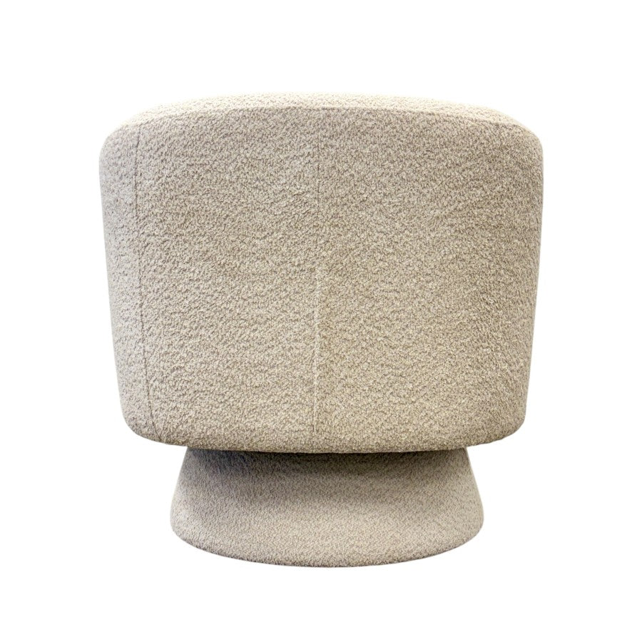 Rear view of the Jenna swivel armchair in Pebble, highlighting its curved back and quality fabric finish.