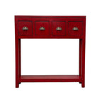Painted console in bright chili red with four drawers and brass handles.