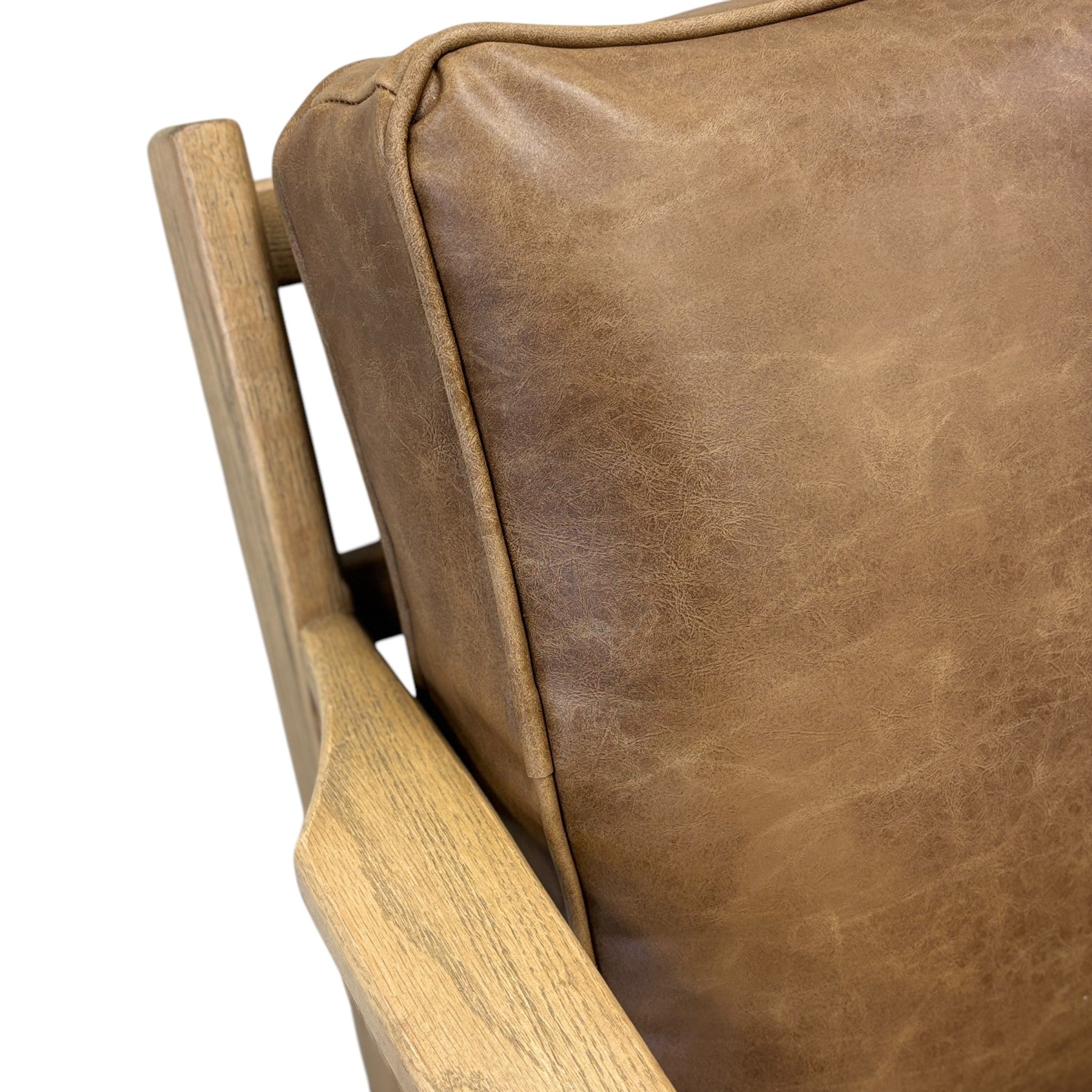 Close-up of the Nero armchair's premium leather upholstery, showcasing the natural grain and quality finish.