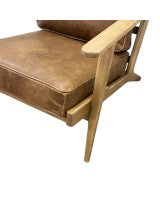 Close-up of the Nero armchair leg, highlighting its quality craftsmanship and contemporary design.