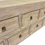 Detail of the natural elm timber grain and panelled top of the Oslo 13 drawer console