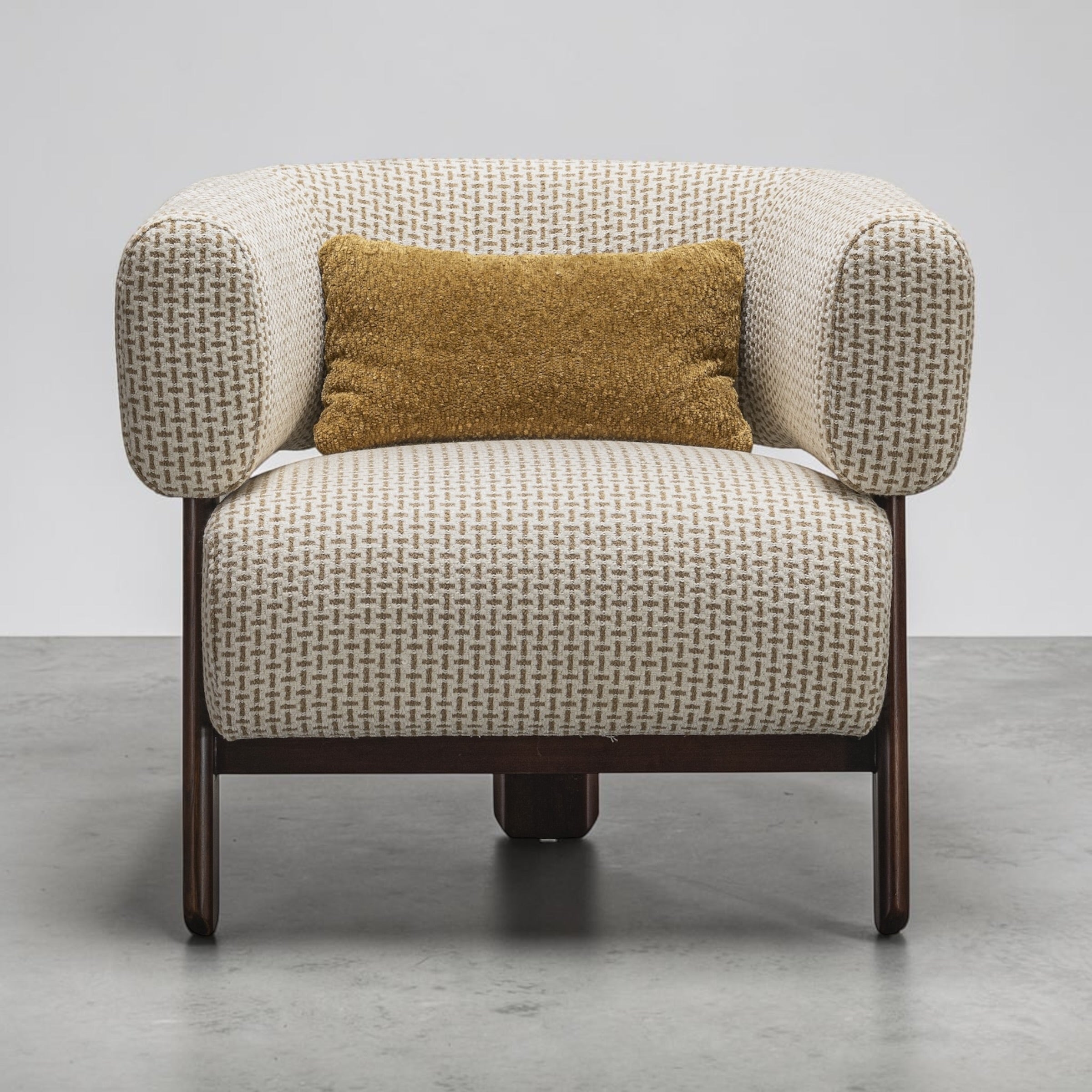 Piper armchair with contemporary design and soft fabric upholstery.