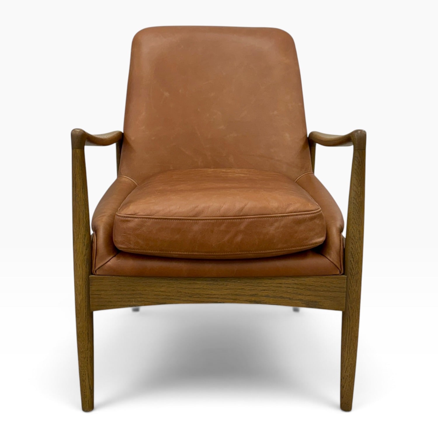 Front view of Portobello Chair with toffee leather upholstery, cushioned seat and solid oak frame