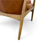 Close-up of Portobello Chair in toffee leather showing the solid oak frame and leather upholstery