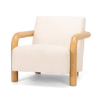 Angled view of the Post armchair, showcasing its solid timber frame and upholstered seat.
