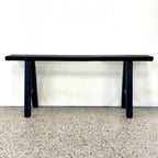 Sammy Bench in black rustic elm with simple timber seat and trestle-style legs