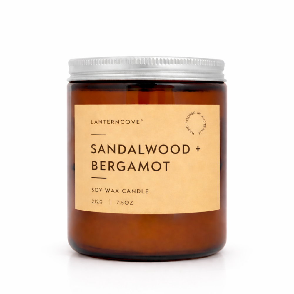 Lantern Cove Glo Sandalwood & Bergamot soy wax candle in amber glass jar with silver lid