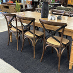 Villa cross back dining char in deep oak at a dining setting