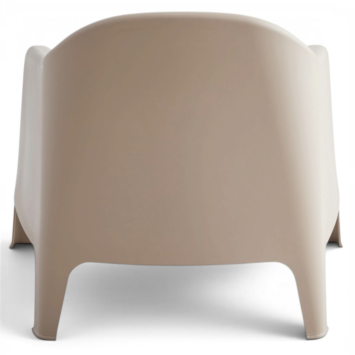 Rear view of the Wainui outdoor chair in sand showing its curved back and integrated legs
