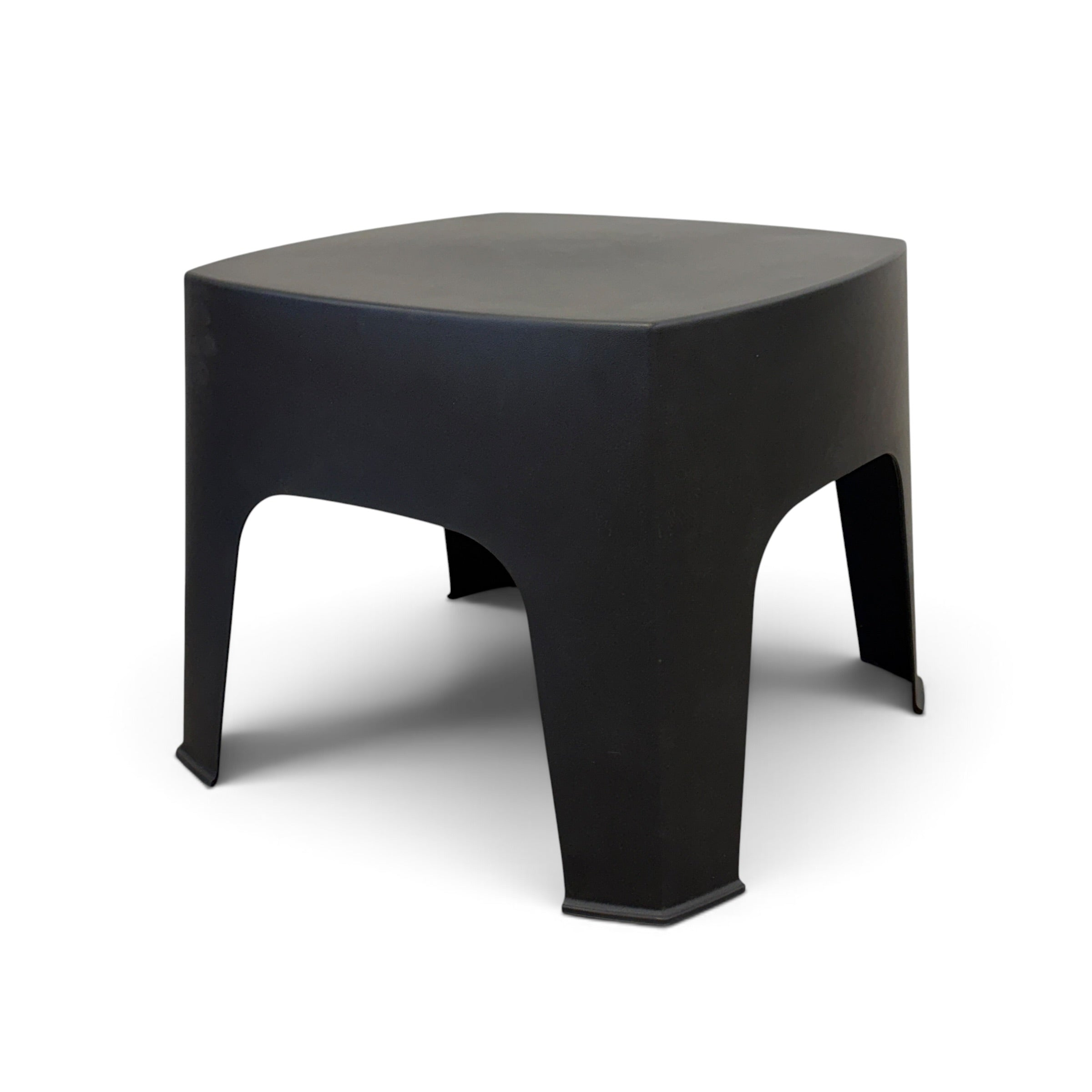 Angled view of Wainui black outdoor side table with clean modern lines and curved corners