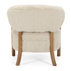 Rear view of the Yak Armchair in Natural featuring soft faux fur upholstery and solid ash timber legs.