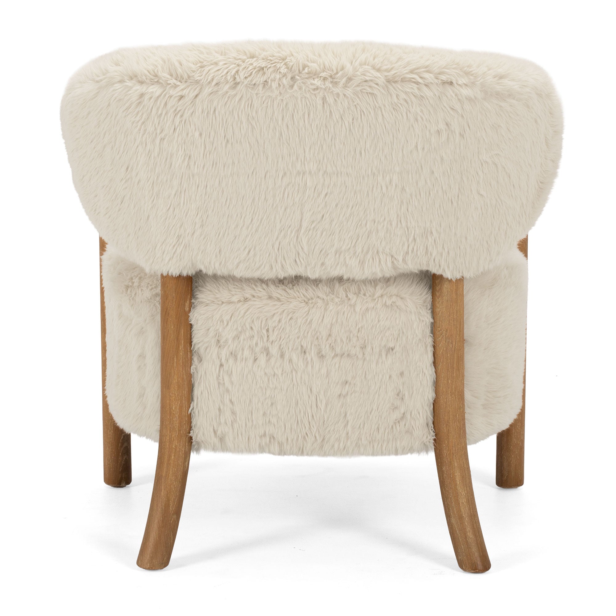 Rear view of the Yak Armchair in Natural featuring soft faux fur upholstery and solid ash timber legs.