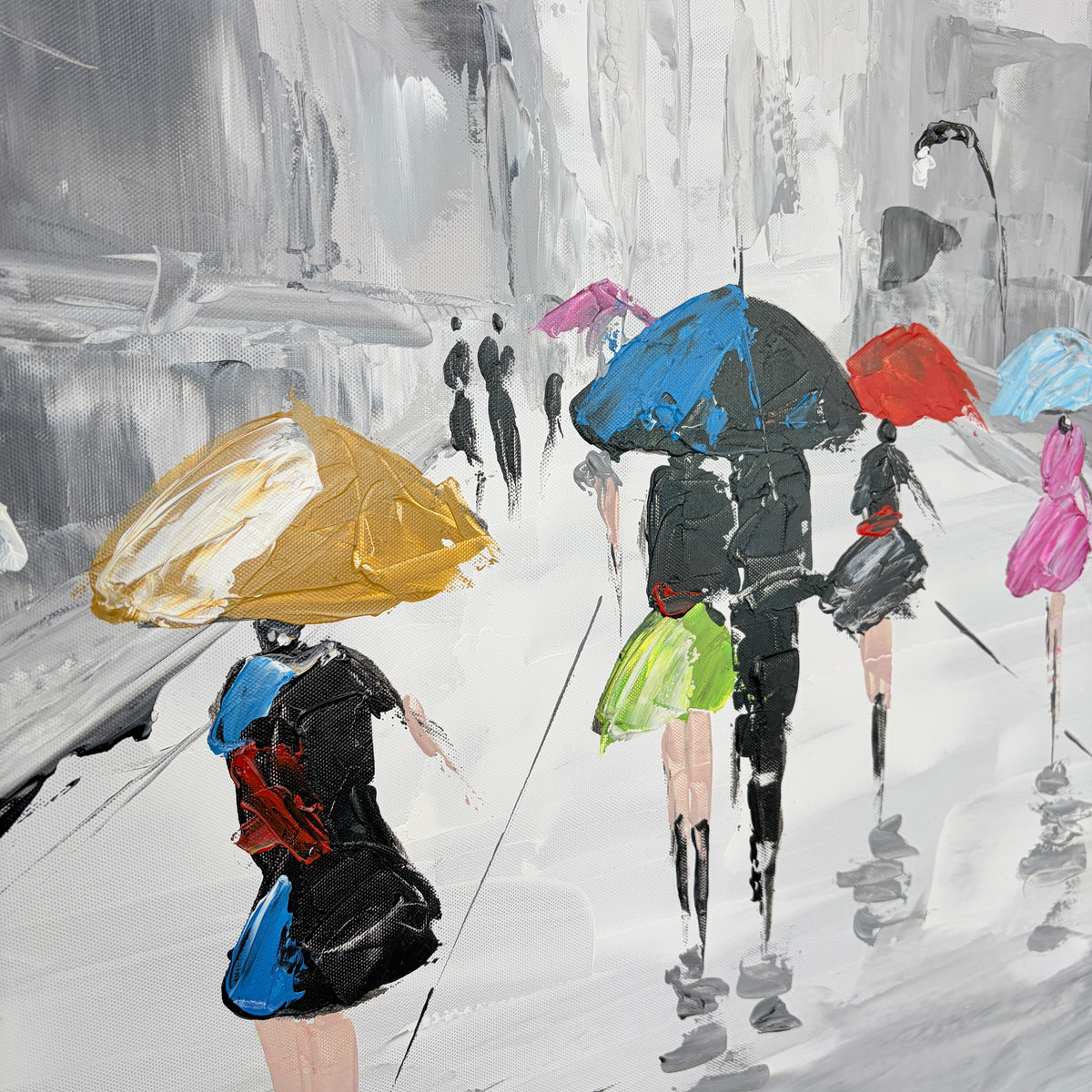 Close-up of textured canvas painting showing people walking beneath colourful umbrellas in the rain