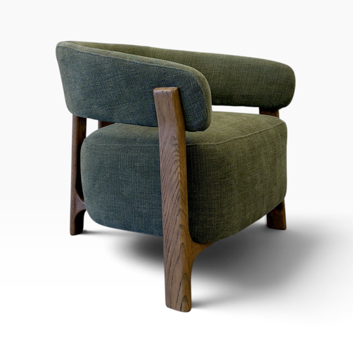 Angled view of Aiden Chair in Kiwi showing textured upholstery and warm timber frame