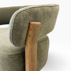 Aiden Chair in Kiwi showing rounded upholstered backrest and natural timber grain