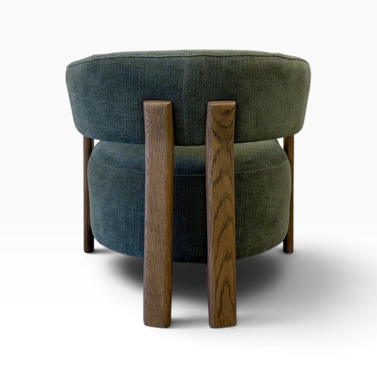 Rear view of Aiden Chair in Kiwi highlighting its curved backrest and distinctive timber supports