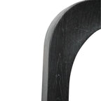 Close-up of Amalie Mirror black frame showing subtle timber grain and softly rounded edges