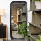 Amalie full-length black mirror measuring 180cm x 80cm displayed in a contemporary living space