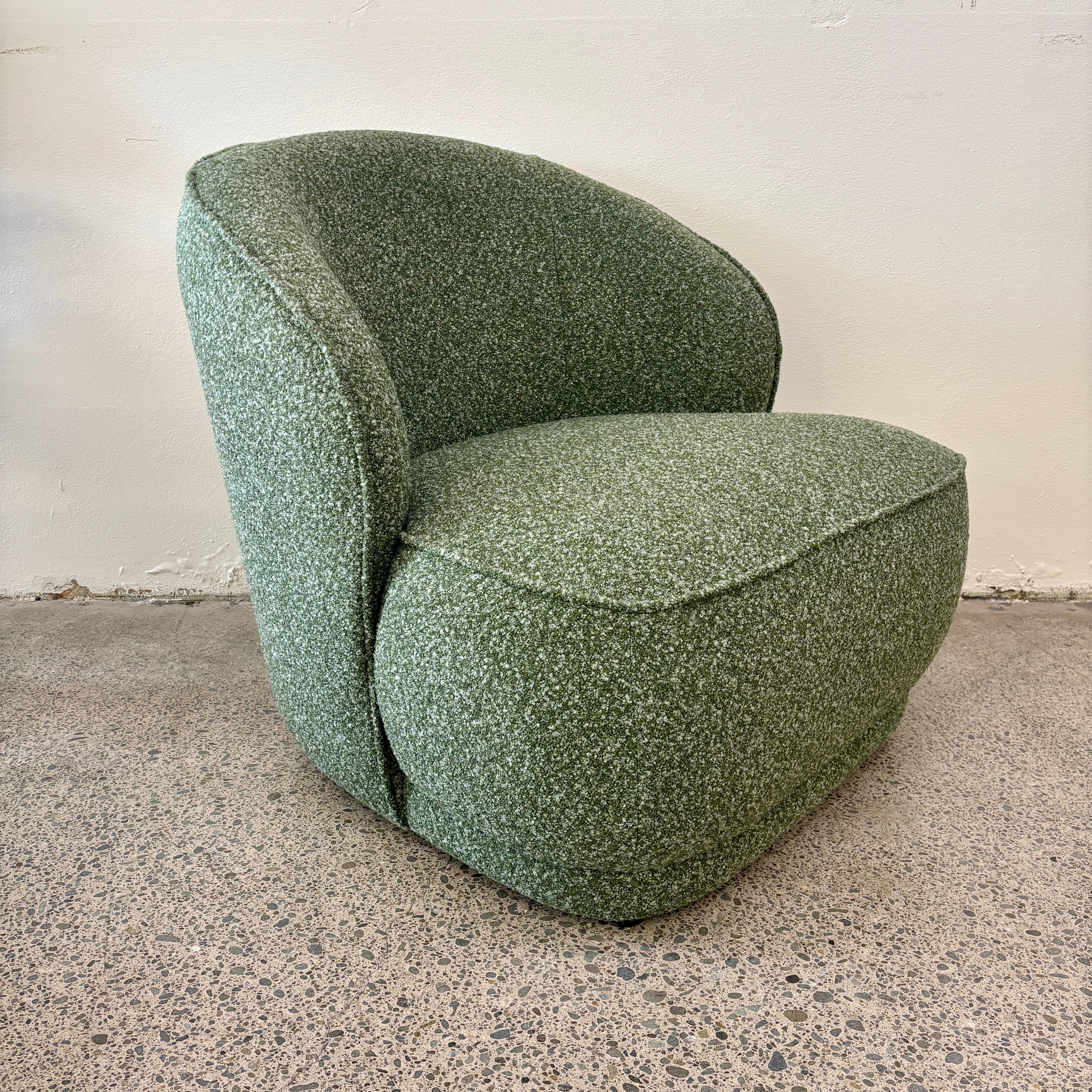 Side profile of the Arlo Chair in Fern, showcasing its solid oak frame, deep seating and contemporary design.