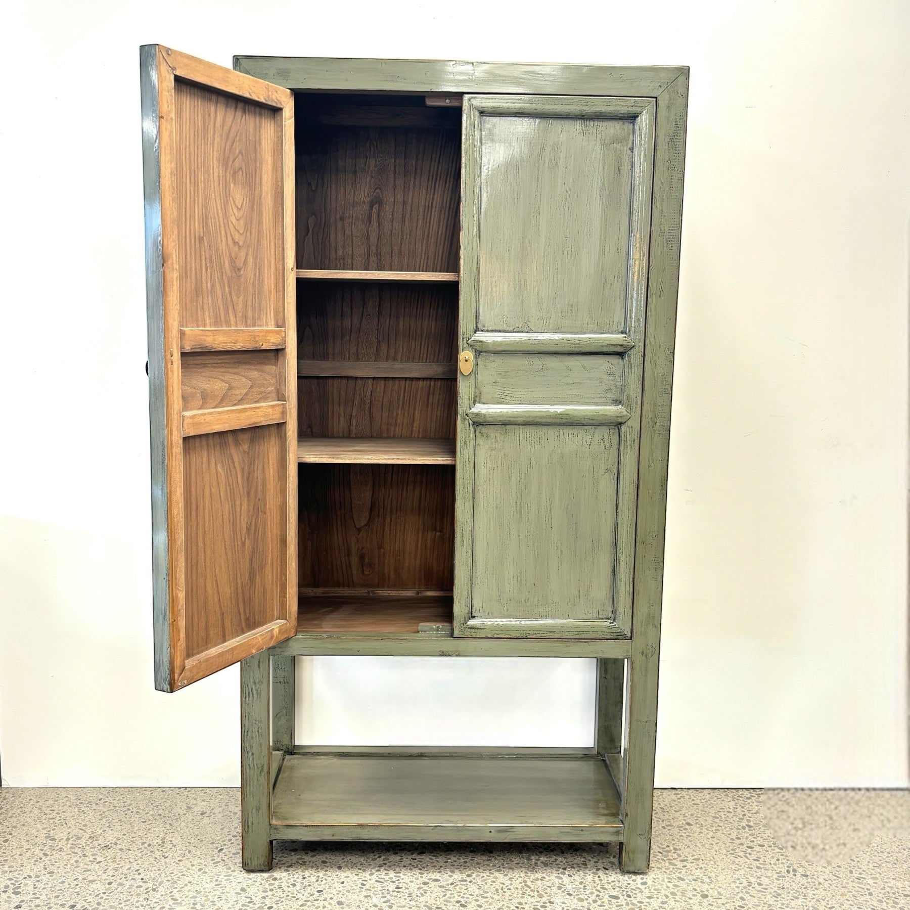 Ayla Storage Cupboard Smoke with doors open showing two internal shelves and lower display shelf