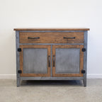 Front view of Barber 2 Door Sideboard in mango wood with brushed steel doors and two drawers