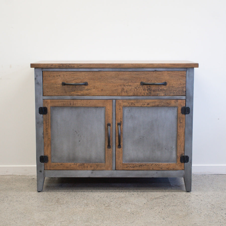 Front view of Barber 2 Door Sideboard in mango wood with brushed steel doors and two drawers