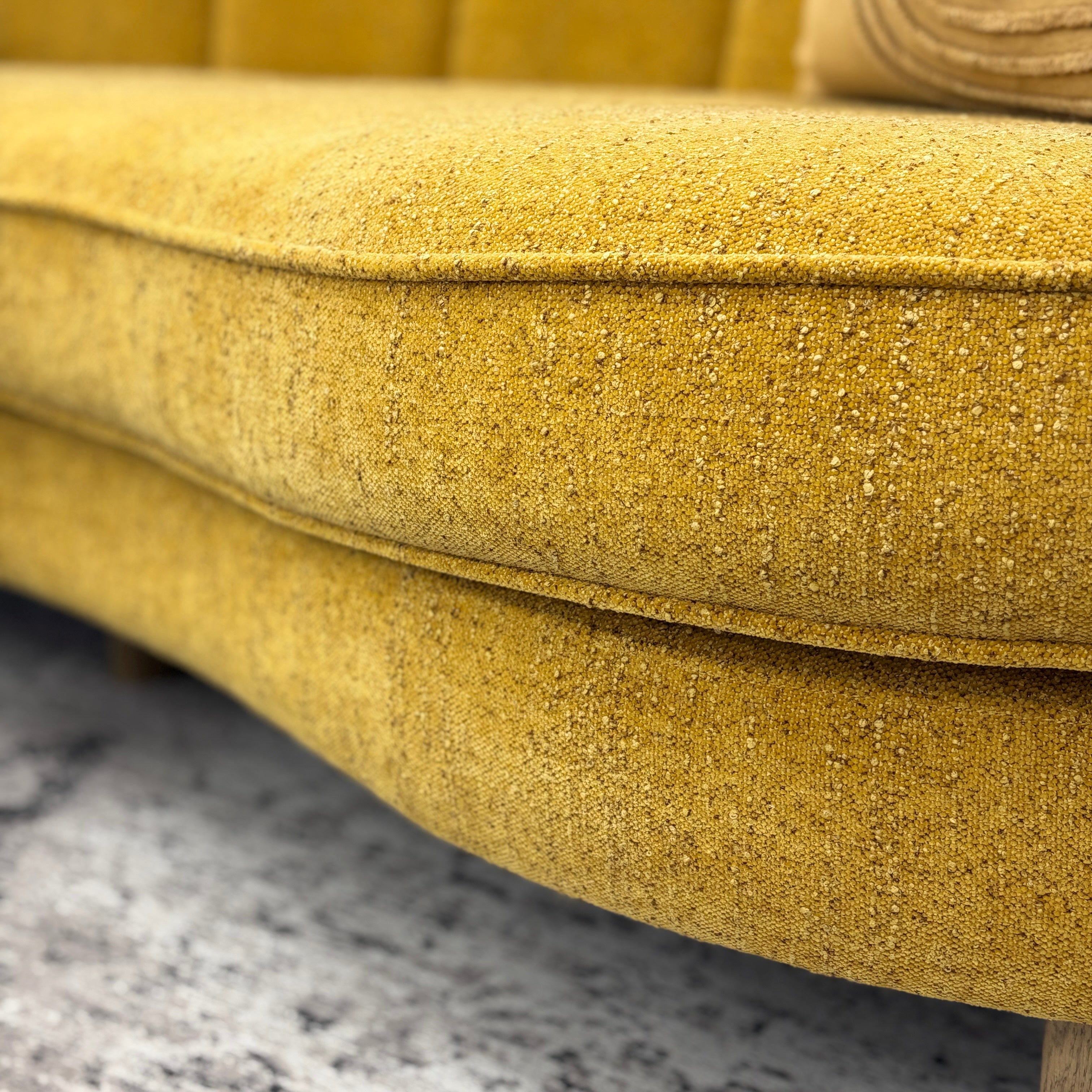 Close-up of the Bardot Sofa's Marigold fabric, showcasing the richly textured upholstery and woven finish.