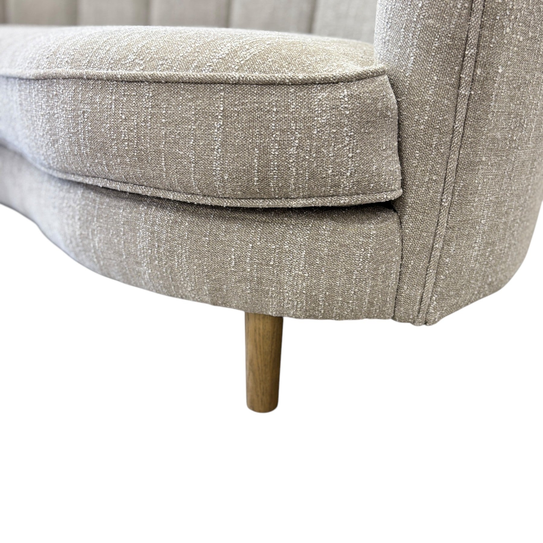 Close-up of the Bardot Sofa's solid timber leg, showcasing its clean contemporary design and quality craftsmanship.