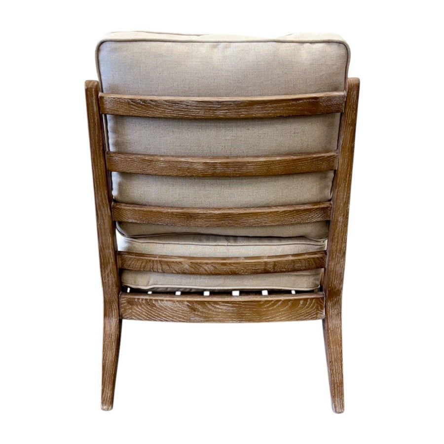 Rear view of the Cameron Chair in Natural, highlighting its upholstered backrest and quality timber frame.