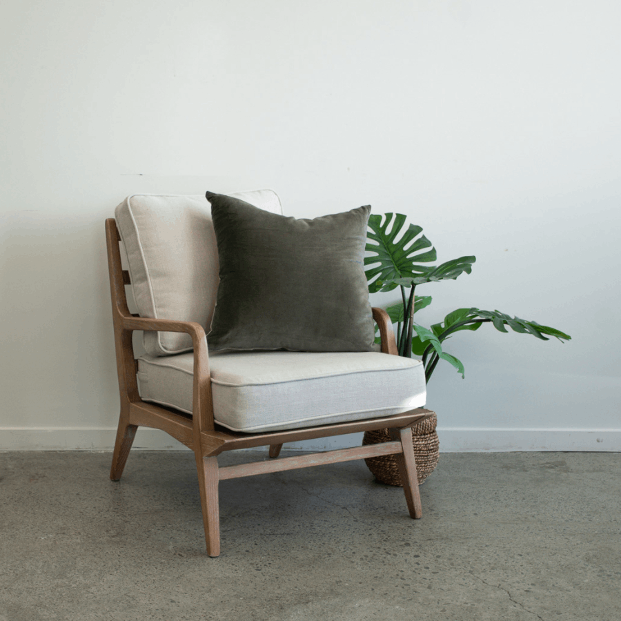 Cameron Chair in Natural styled in a contemporary living room with complementary décor.