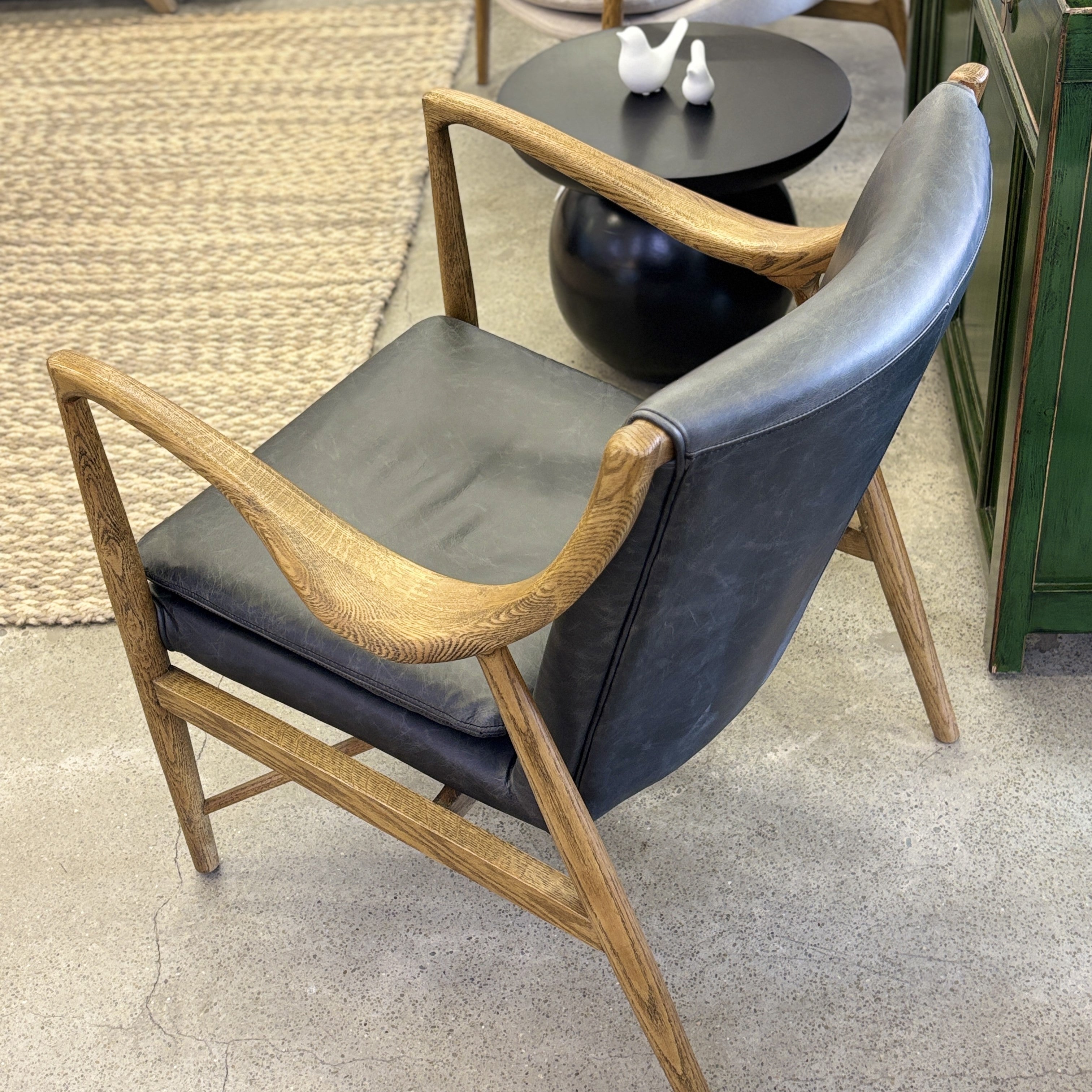 Overhead view of the Coco Occasional Chair, highlighting the generously cushioned leather seat and supportive backrest.