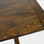 Close-up of the Cross Leg Extension Dining Table top showing the natural grain, markings and character of the rustic timber finish.