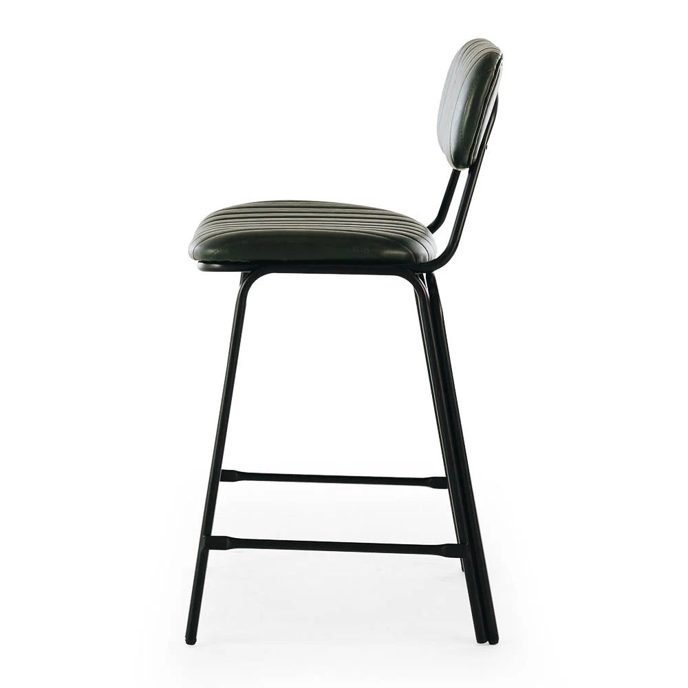 Side view of the Datsun Bar Stool highlighting its slim black metal frame, comfortable seat and 65cm seat height for standard kitchen benches.
