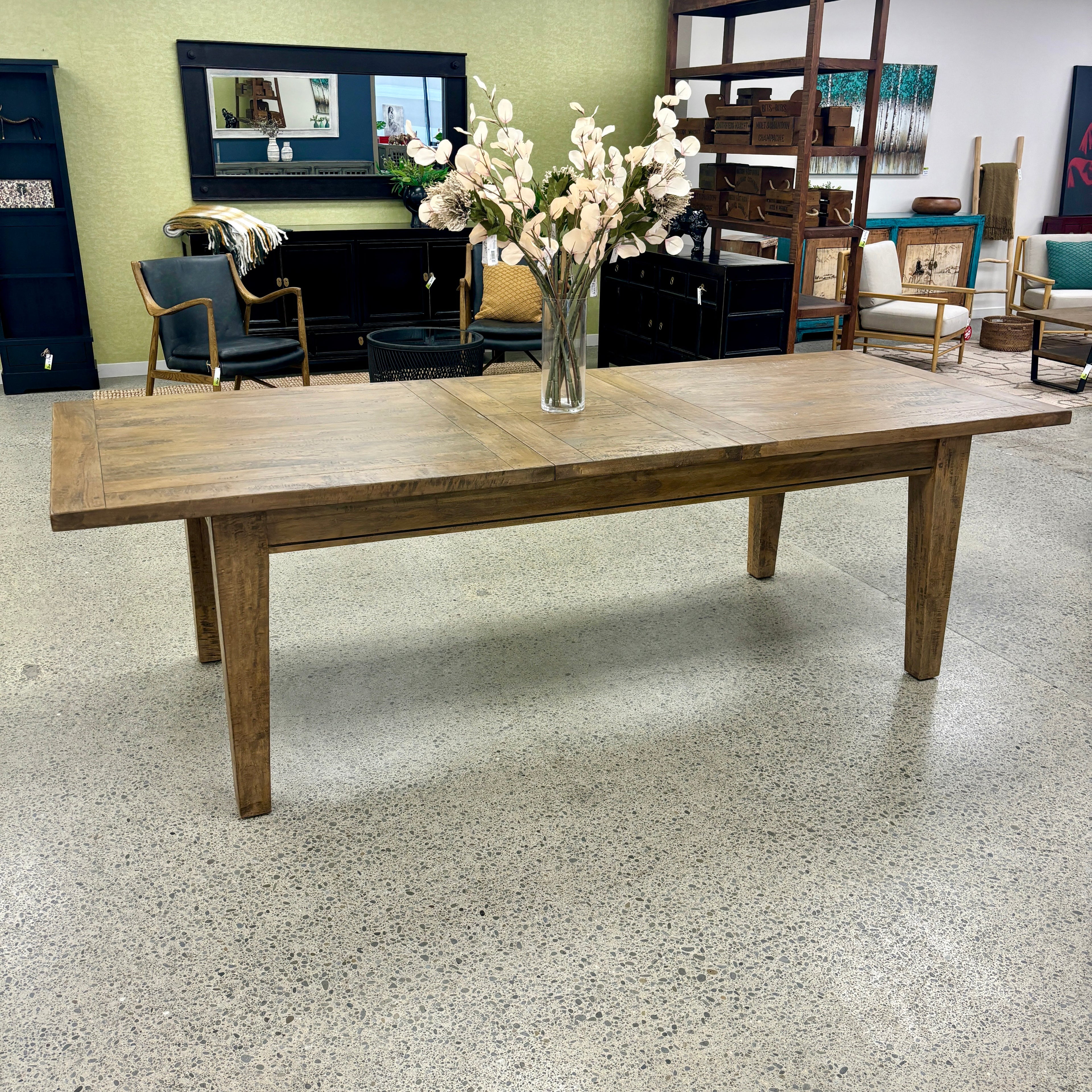 The Double Leaf Extension Table fully extended to 3.1 metres, comfortably seating up to 12 people for family gatherings and entertaining.