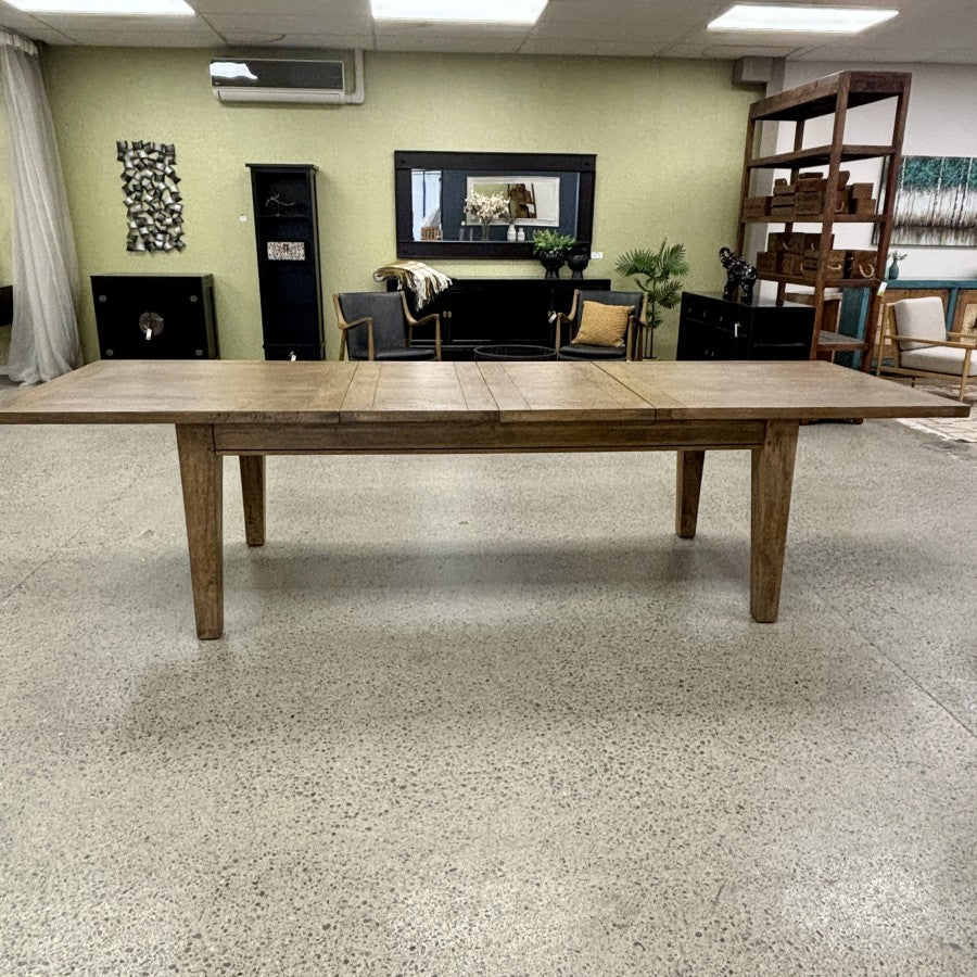 The Double Leaf Extension Table on display in our Christchurch showroom, showcasing its timeless design and substantial solid timber construction.