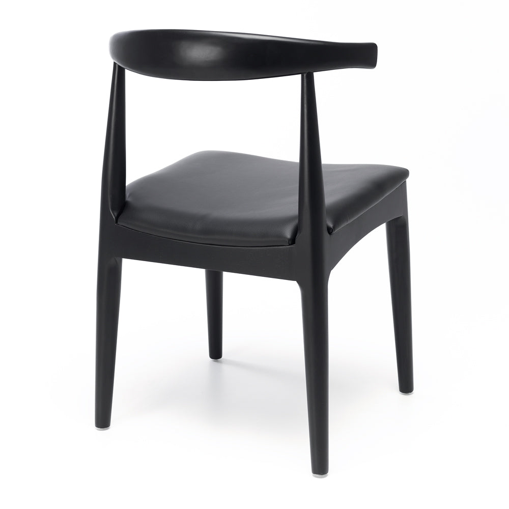 Rear view of black Elbow Dining Chair showing sculpted curved oak backrest