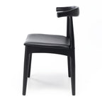 Side view of Elbow Dining Chair Black showing curved solid oak frame and black seat
