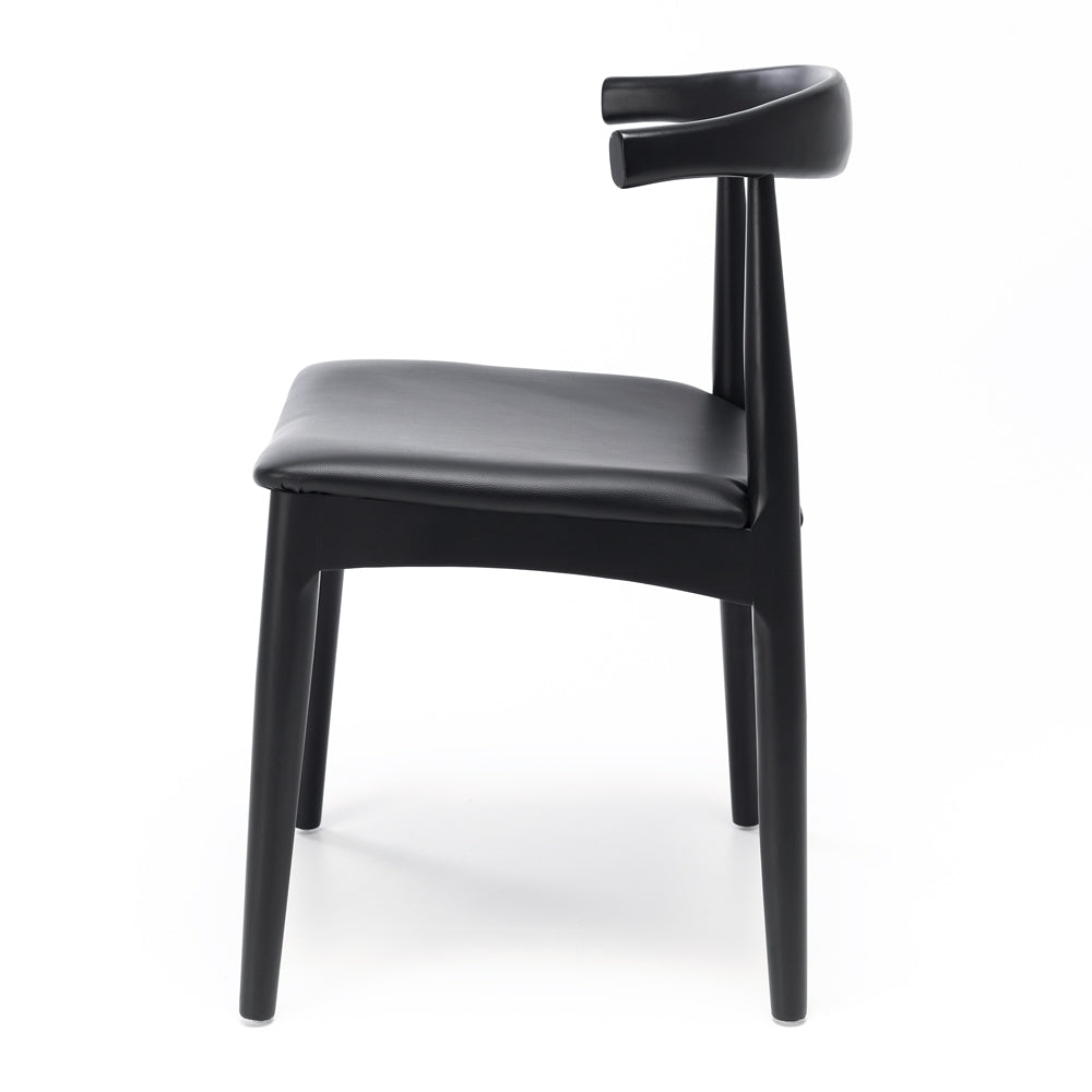Side view of Elbow Dining Chair Black showing curved solid oak frame and black seat