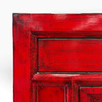 Close-up of the distressed Chilli red finish and timber detailing on the Elliot Sideboard