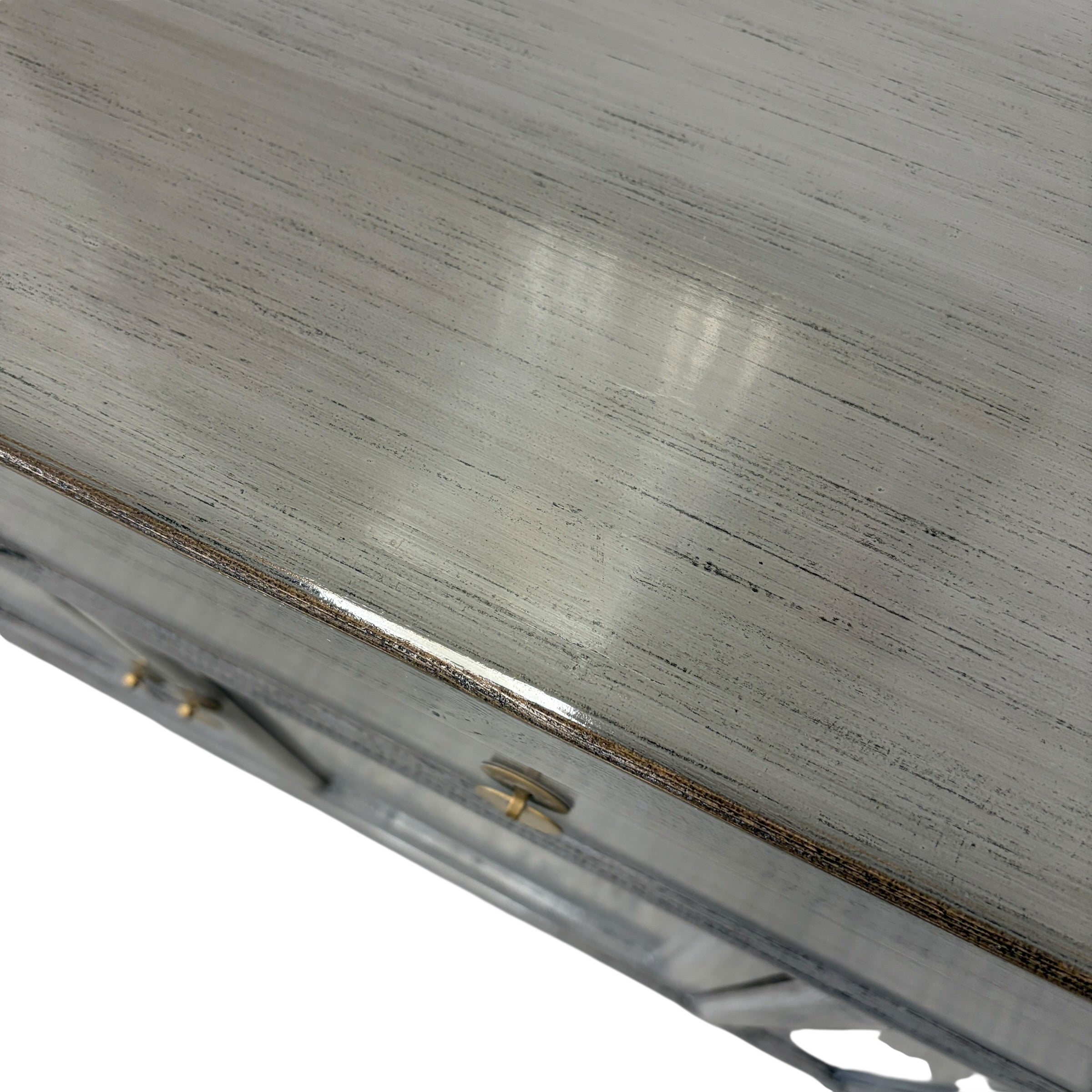 Close up of Elliot Sideboard showing layered glossy grey lacquered pine finish