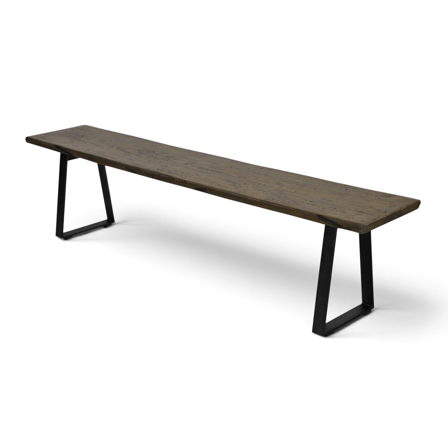 Angled view of the Evolution mango wood bench seat with black iron legs and bracing