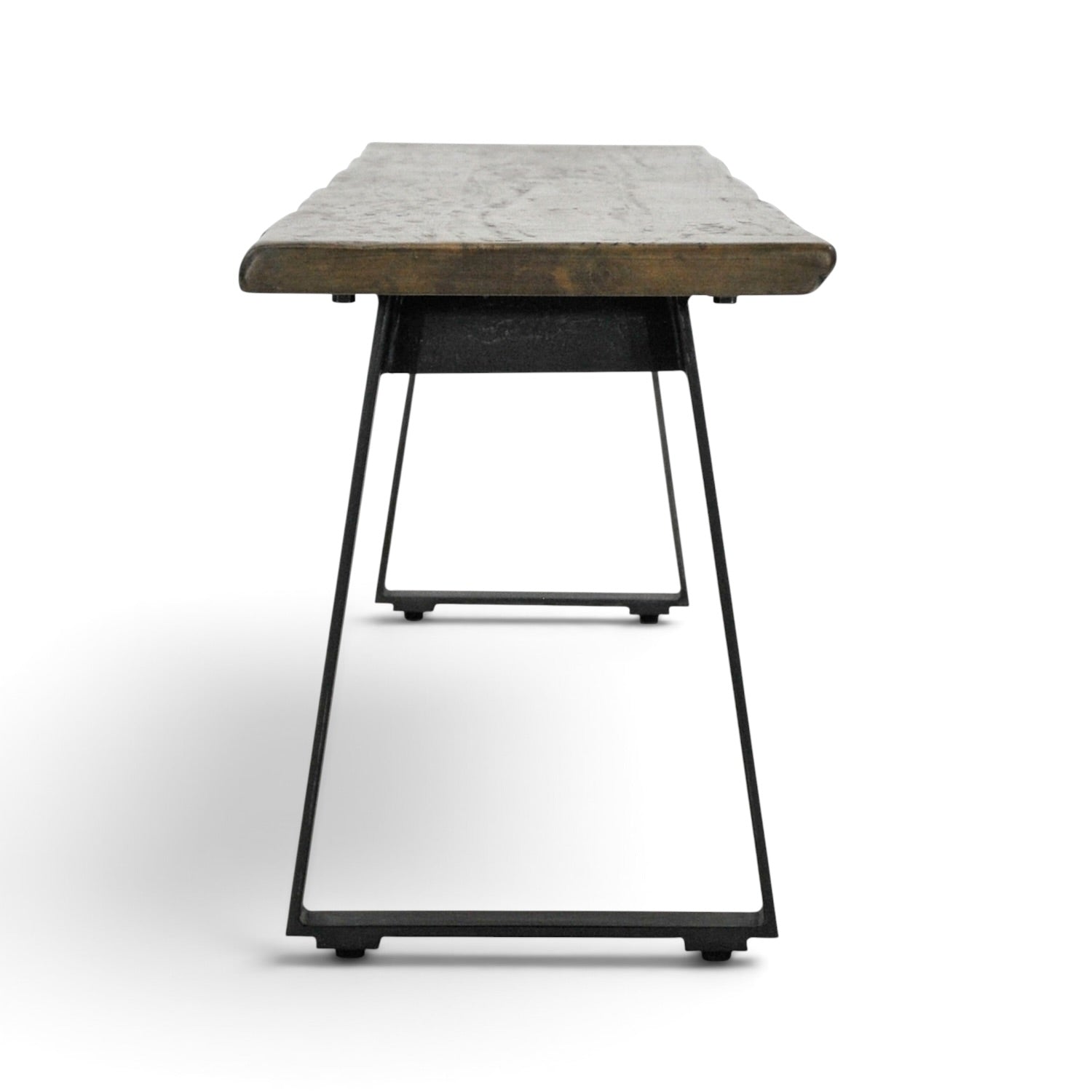 Side view of the Evolution bench seat in Smokehouse mango wood with black iron legs