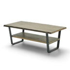 Angled view of the Evolution coffee table with natural distressed timber top, lower shelf and black iron legs