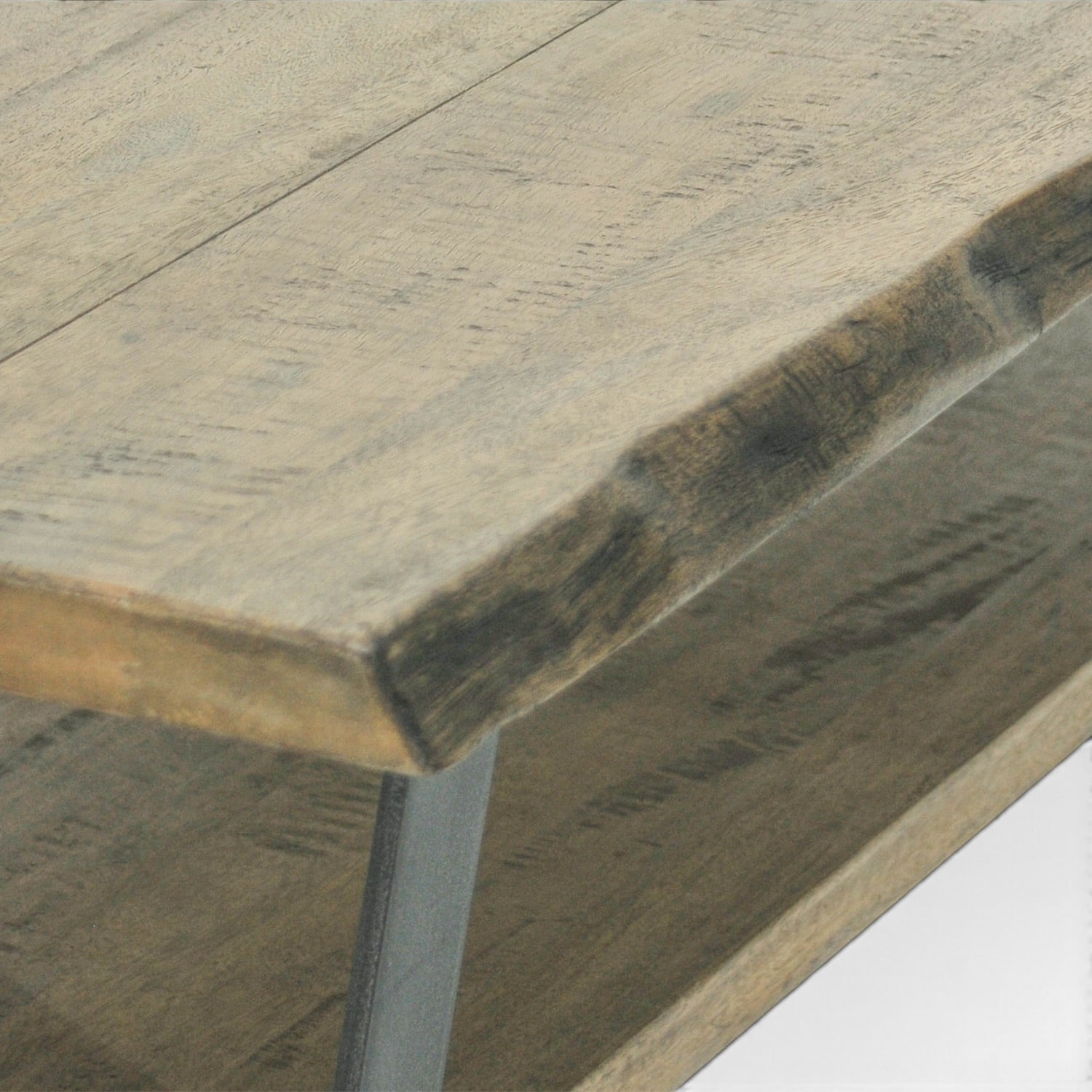 Close-up of the Evolution coffee table showing the textured distressed timber grain and natural edge detail